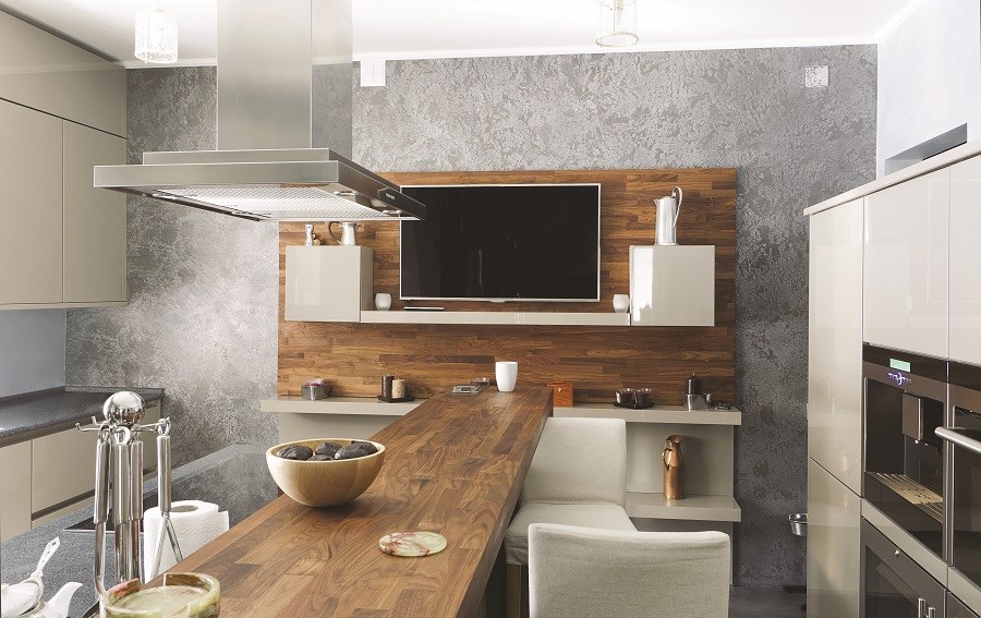 Photo is of a kitchen with a neutral wood color scheme. 